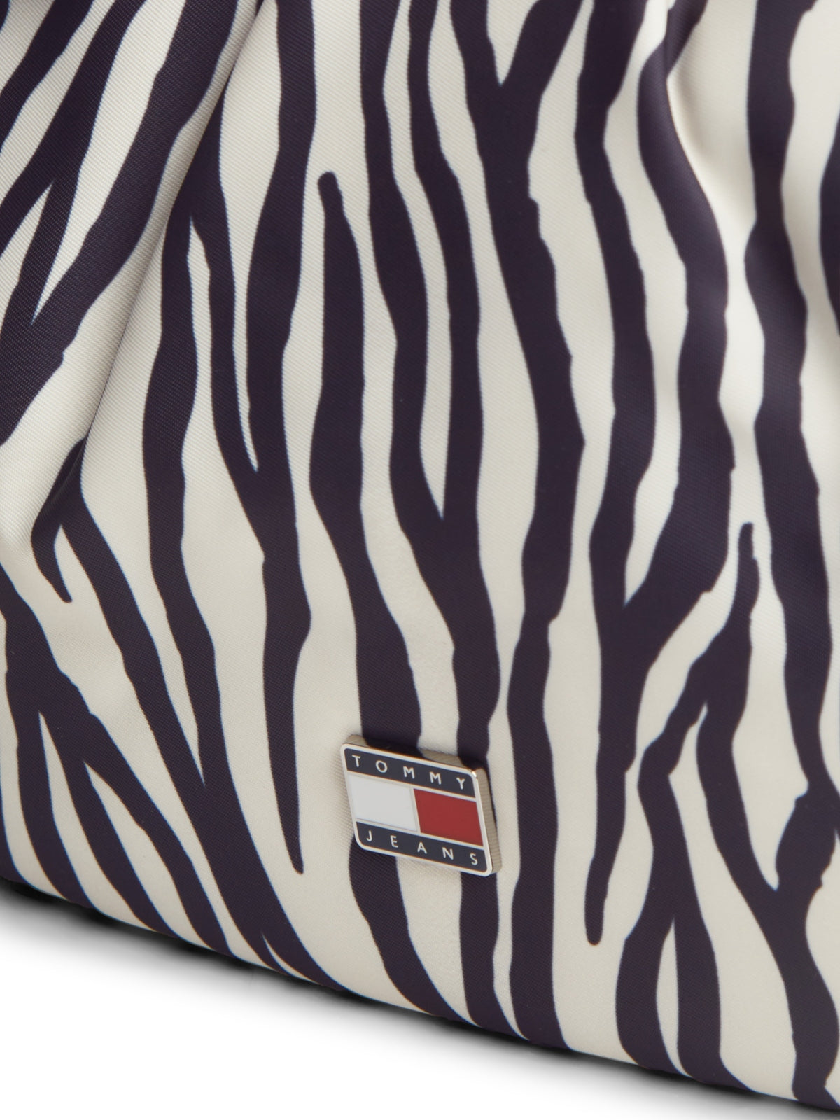 TOMMY JEANS AWAW TJW ICON CHARMS en color ANIMAL PRINT (5)