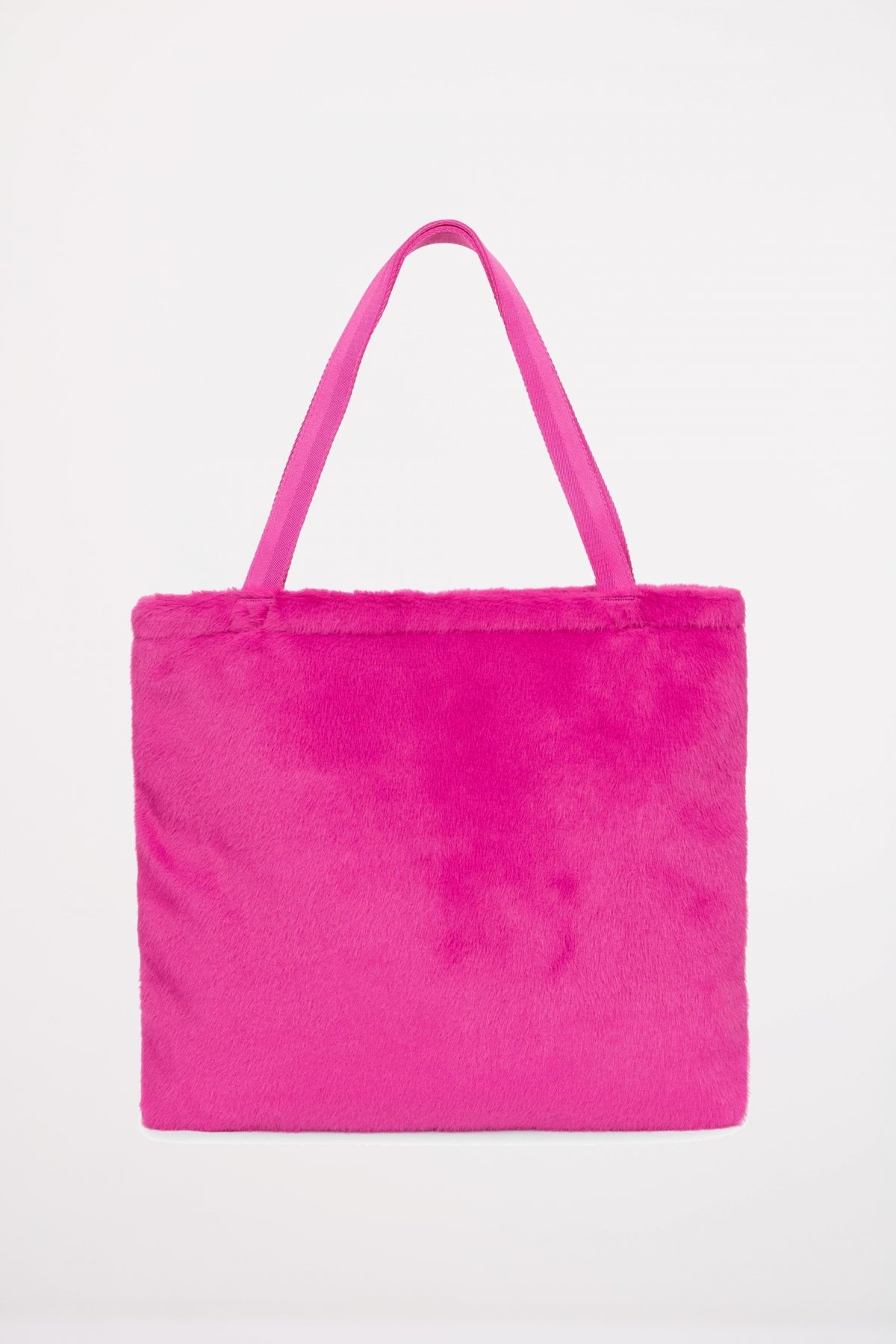 EASTPAK CHARLIE FUZZY en color ROSA (2)