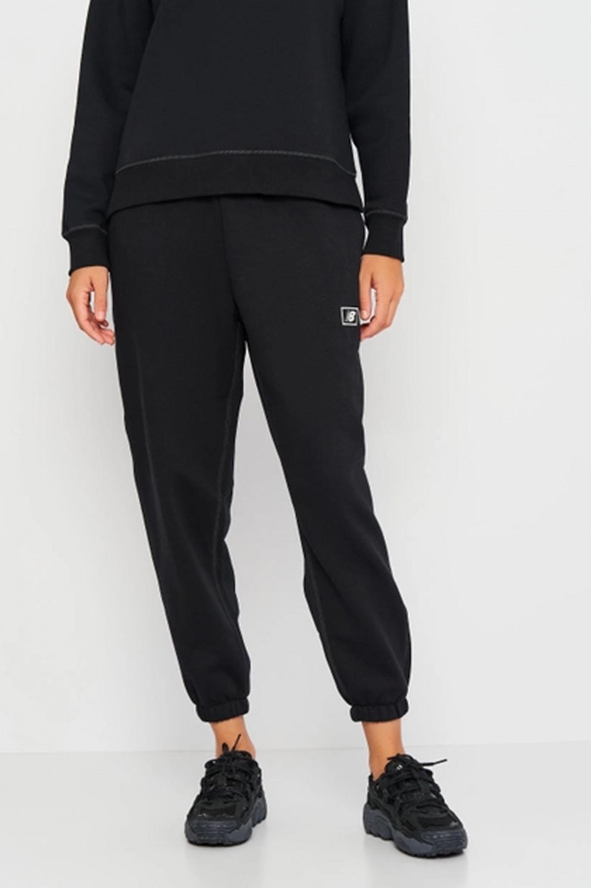 NEW BALANCE BRUSHED FLEECE PANT en color NEGRO (1)