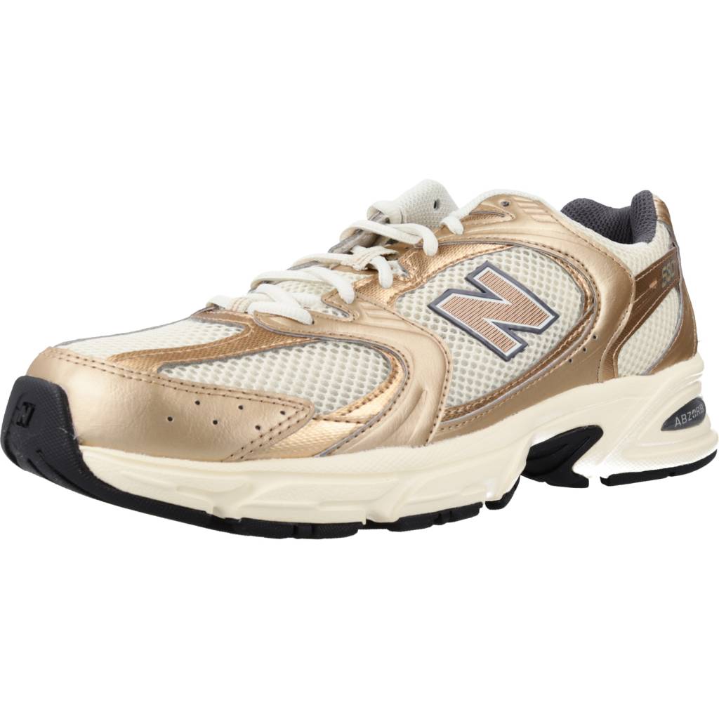 NEW BALANCE MR LA en color ORO (4)