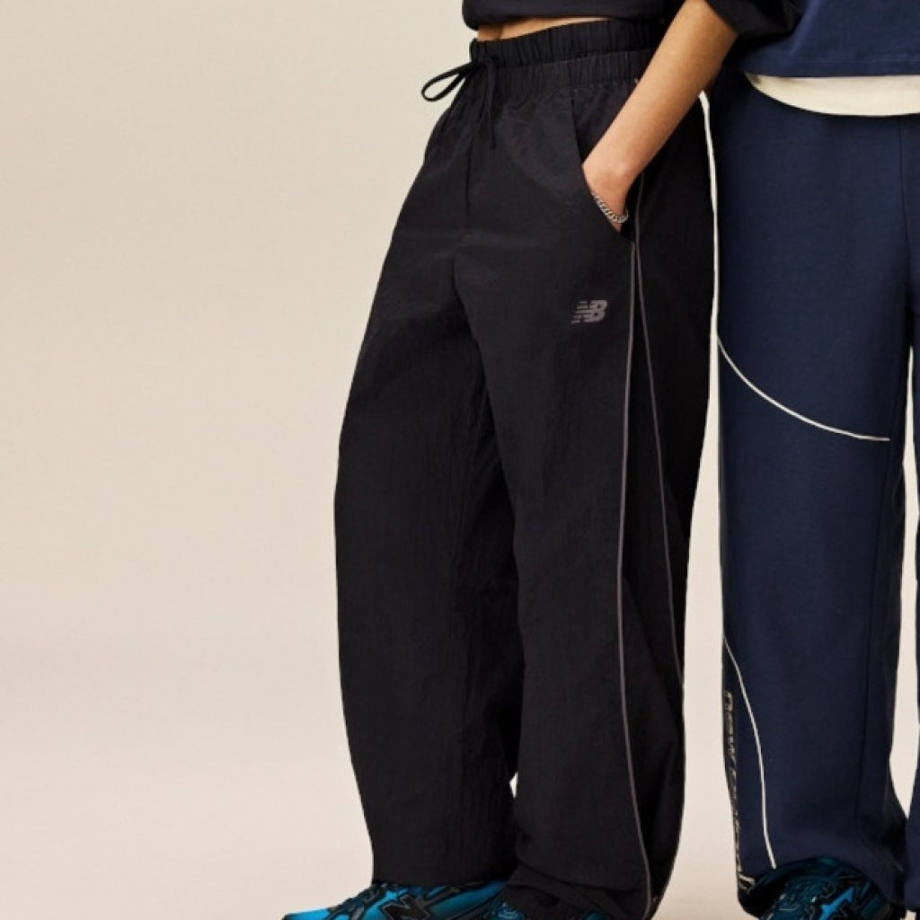 NEW BALANCE WBZE SPORT LEGACY PANT en color NEGRO (5)