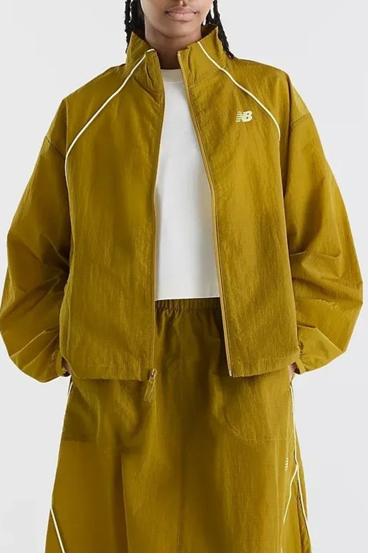 NEW BALANCE WJKS SPORT LEGACY JACKET en color (2)
