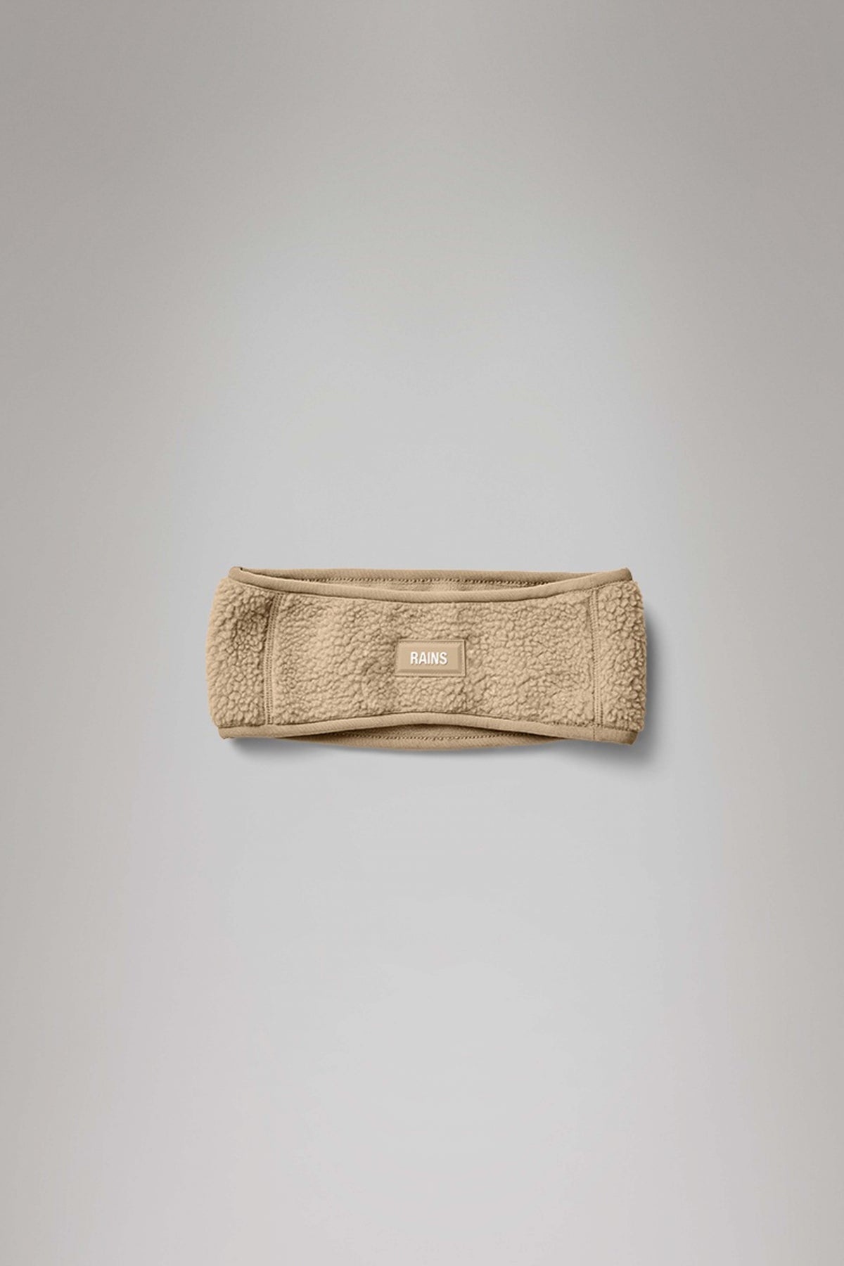 RAINS FLEECE TRAPPER HAT WT en color BEIS (1)
