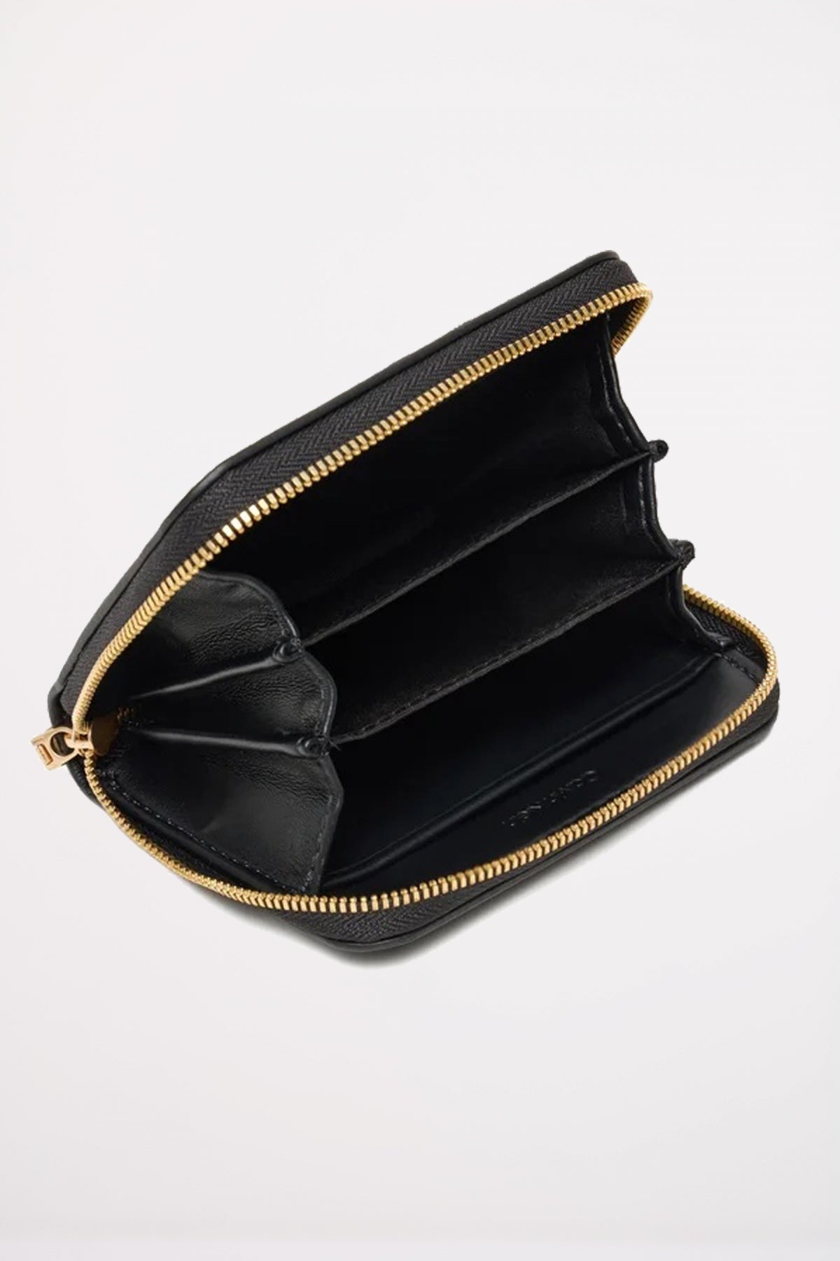 CALVIN KLEIN  RAISED CK MEDIUM ZIP ARO  en color NEGRO  (3)
