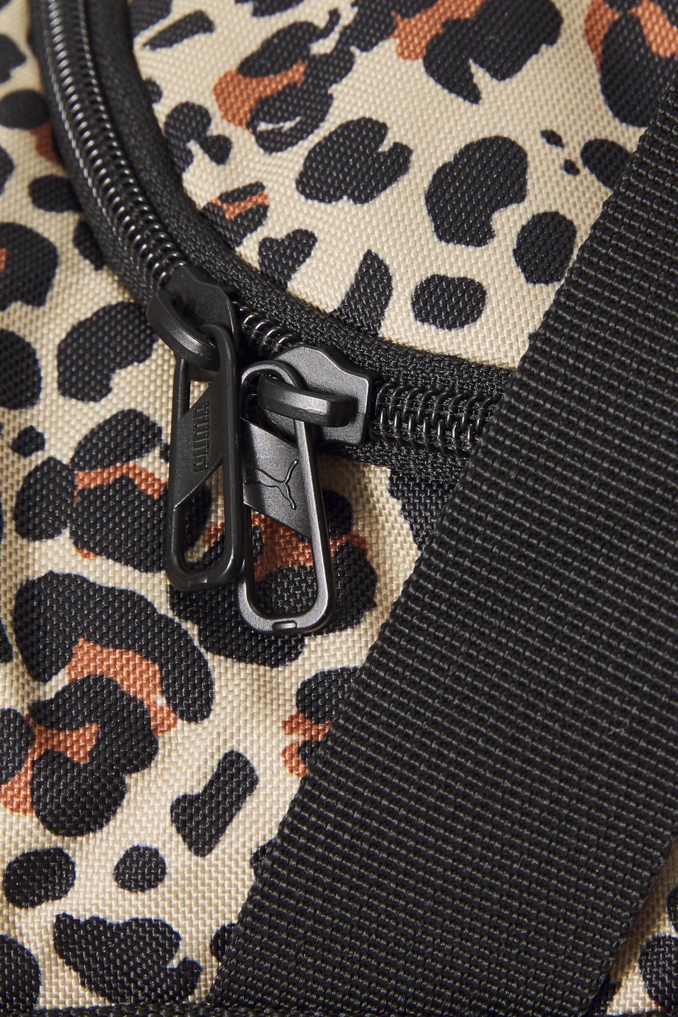 PUMA  PUMA CHALLENGER AOP SMALL S en color ANIMAL PRINT  (3)