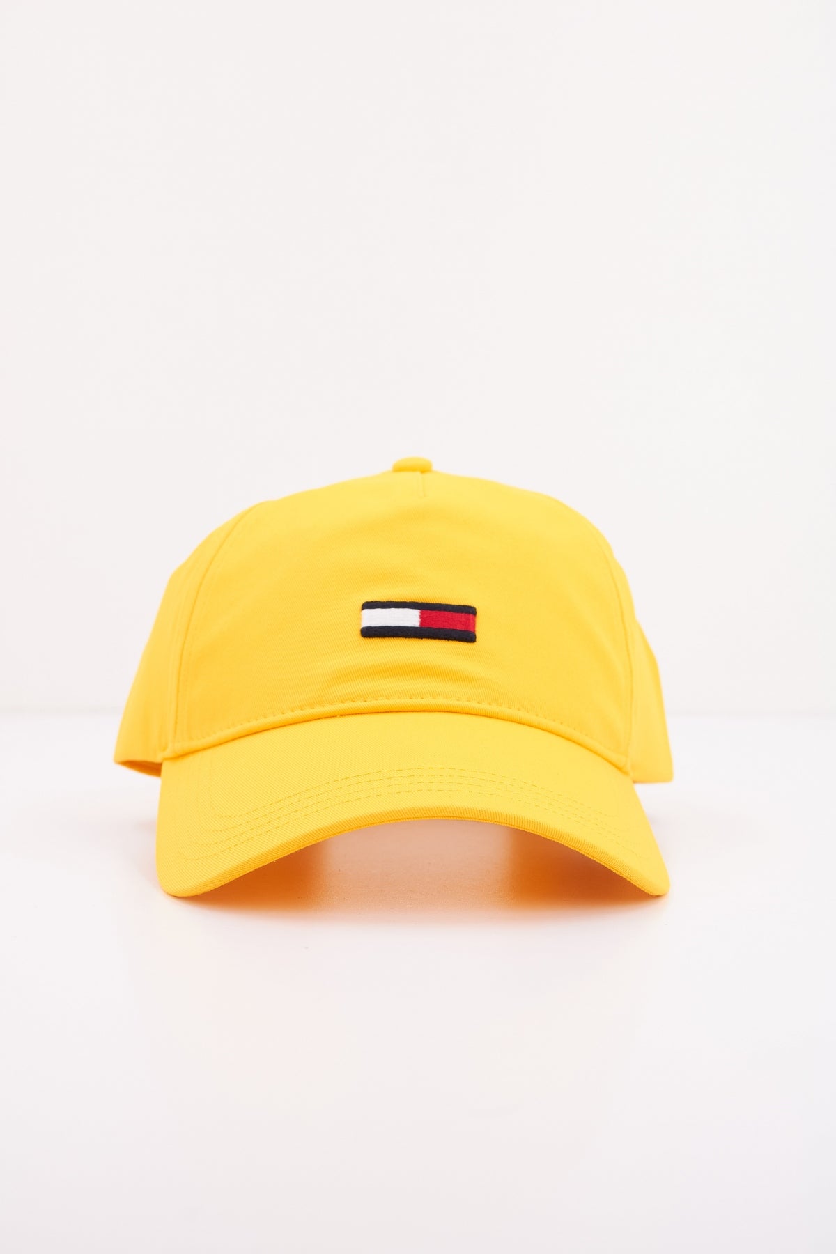 TOMMY JEANS TJW ELONGATED FLAG CAP en color AMARILLO  (1)