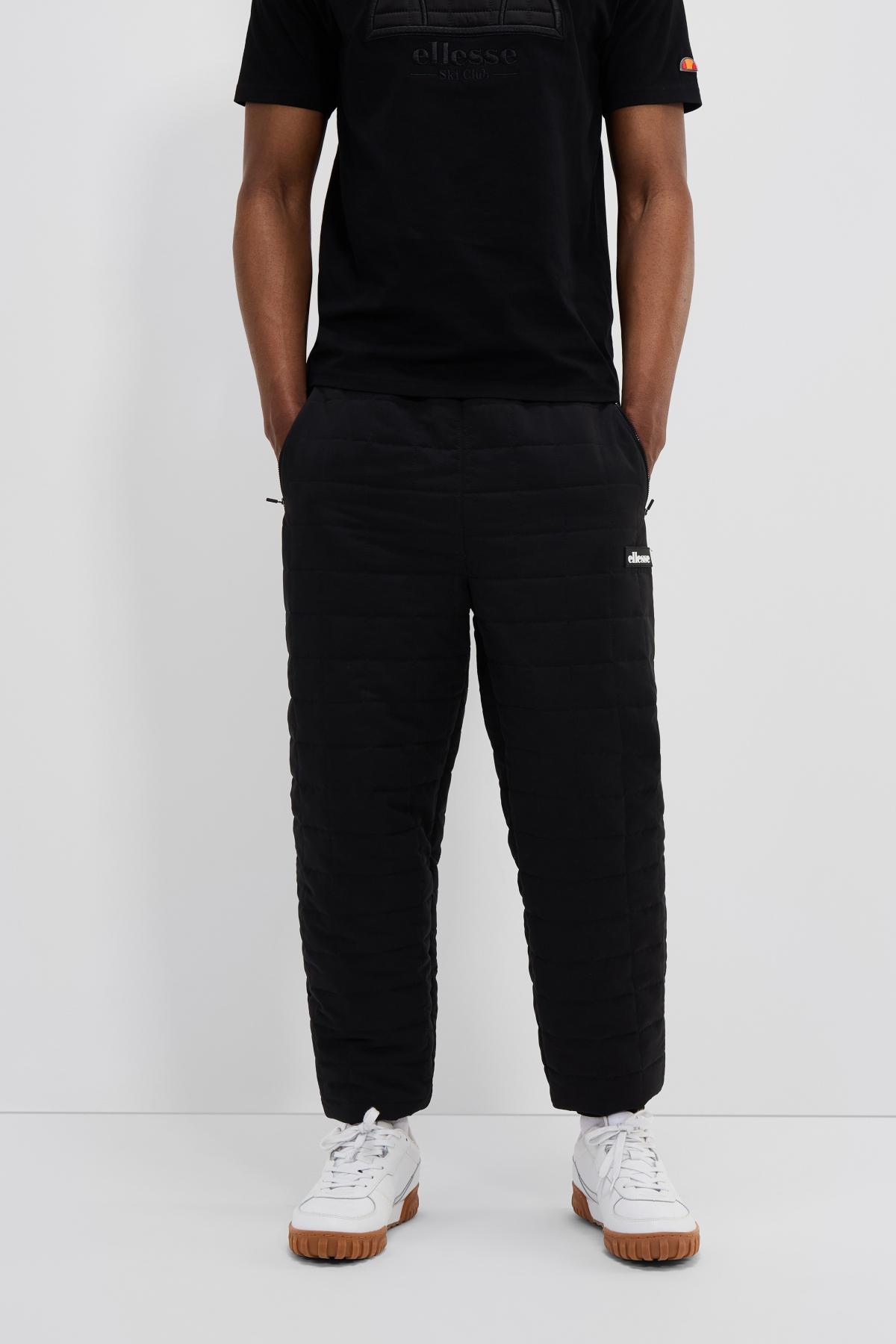 ELLESSE REMERA TRACK PANT en color NEGRO  (1)