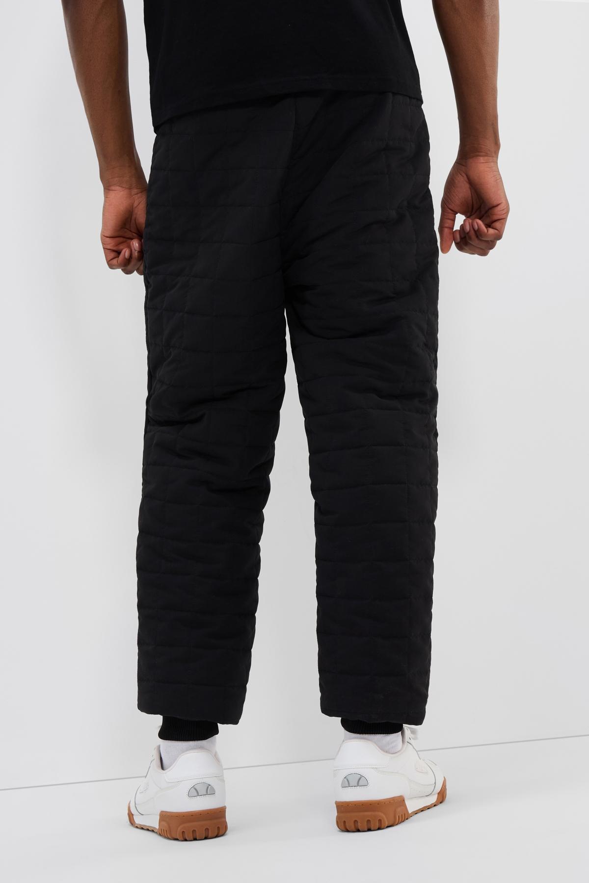 ELLESSE REMERA TRACK PANT en color NEGRO  (2)