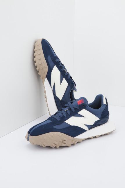 NEW BALANCE UXC QI  en color AZUL  (1)