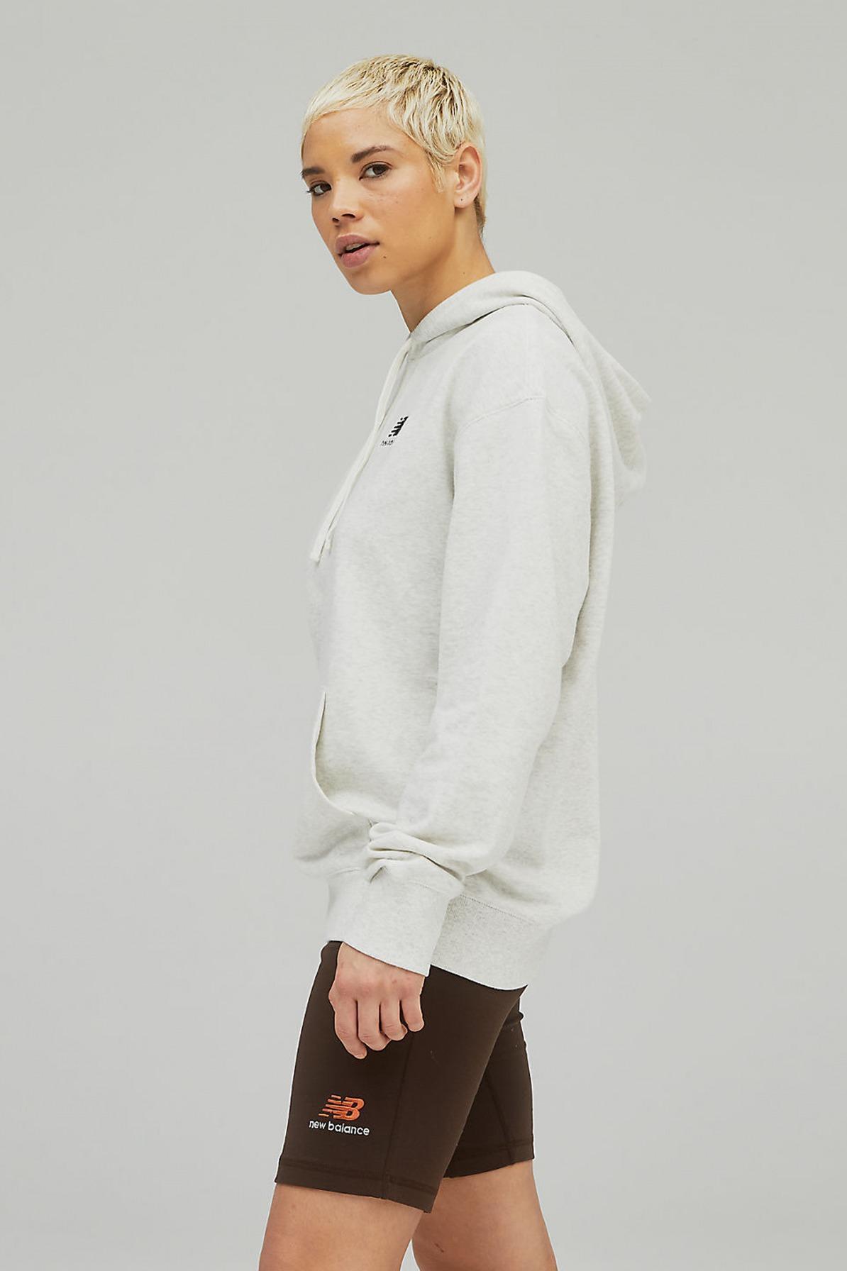 NEW BALANCE TERRY HOODIE en color GRIS  (2)