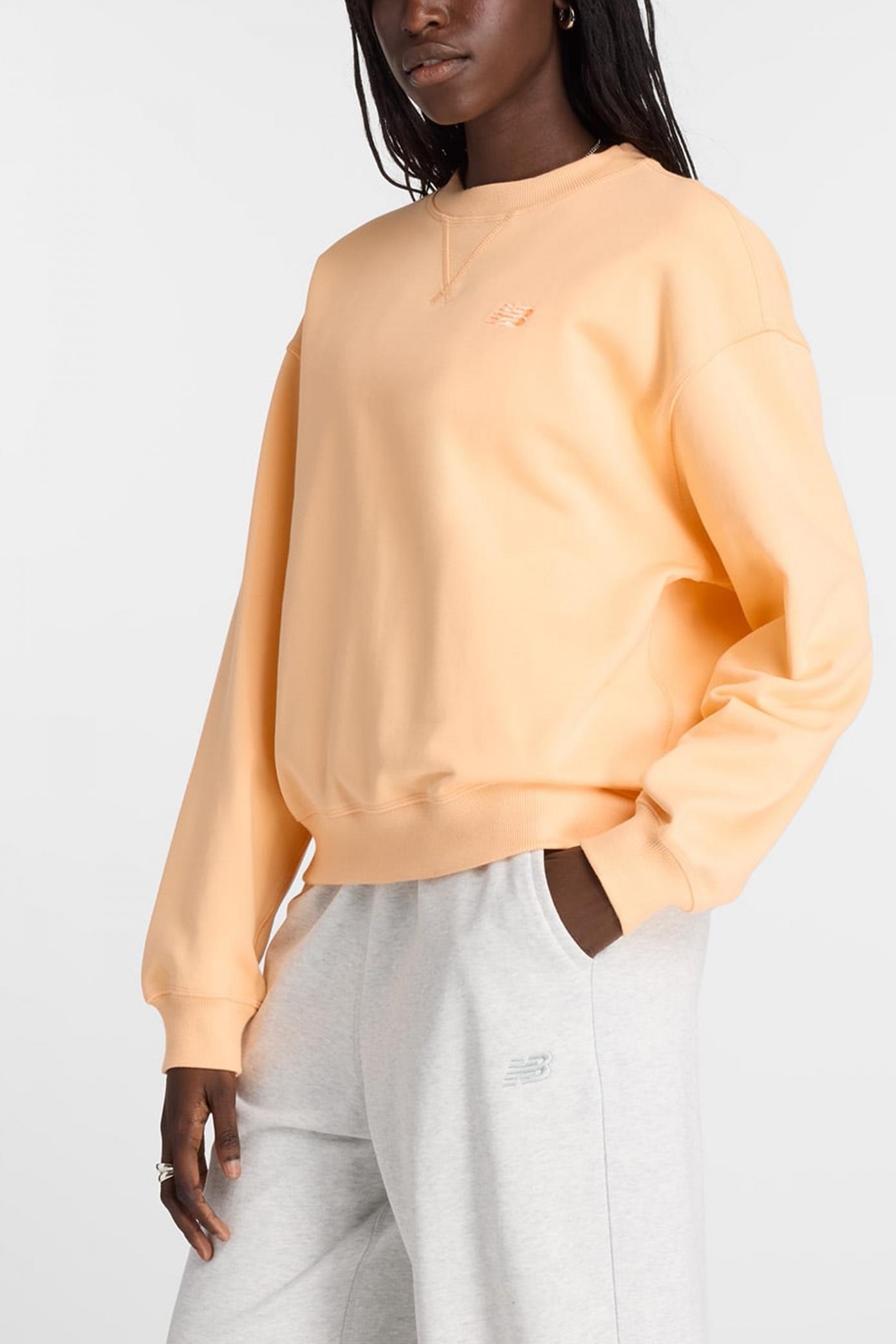 NEW BALANCE  ATHLETICS FRENCH TERRY CREW en color NARANJA  (1)