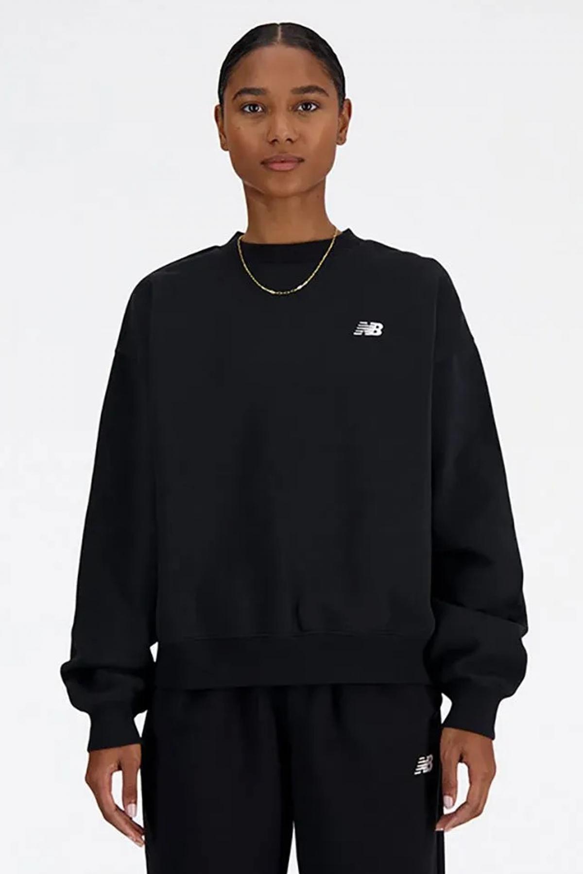NEW BALANCE SPORT ESSENTIALS FLEECE CRE en color NEGRO  (1)