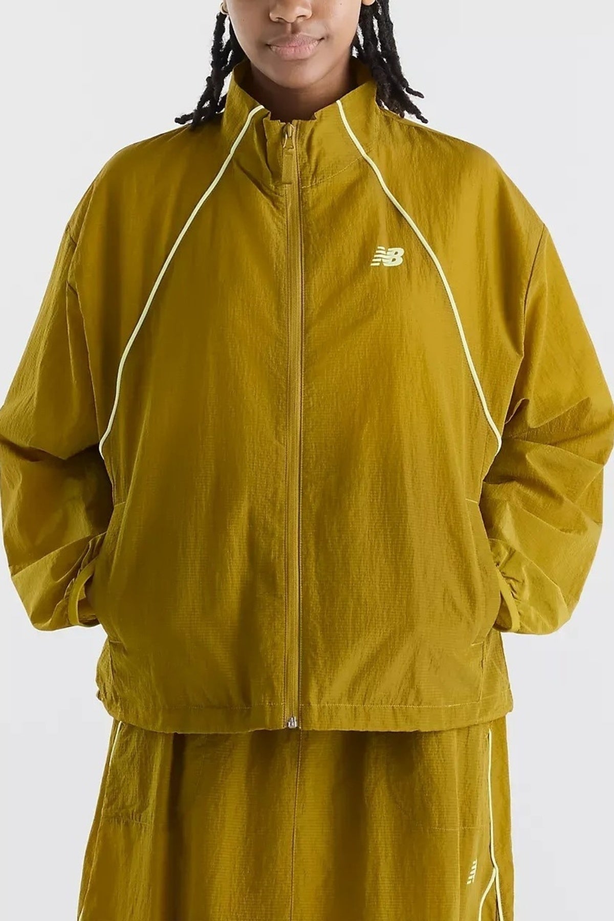 NEW BALANCE WJKS SPORT LEGACY JACKET en color   (1)